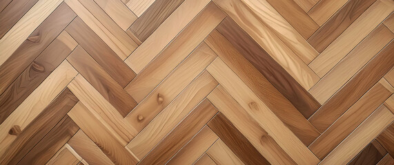 Photo of a light wood herringbone parquet floor texture.