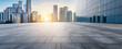 © ABCDstock - Empty square floors with modern city buildings scenery at sunrise. Panoramic view.