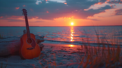 Wall Mural - A peaceful scene on the beach at sunset, with an acoustic guitar leaning against a log
