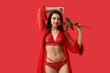 © Pixel-Shot - Attractive young woman in sexy lingerie with rose flower on red background