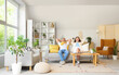 © Pixel-Shot - Young couple resting on sofa at home