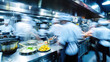 © Kondor83 - Team of chefs in professional kitchen, motion blur. Stressful physical job concept