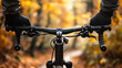 © Graphic Master - A cyclist's hands grip the handlebars with determination