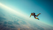 © Graphic Master - A solo skydiver executes a perfect barrel roll as they twist