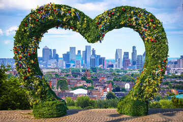 Wall Mural - City of London skyline view from Hampstead Heath through flower frame