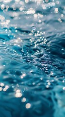 Wall Mural - Closeup blur abstract of surface blue water, Abstract of surface blue water reflected with sunlight for backgroundTop view of blue water Water splashed abstract background