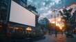 © Saysamorn - Blank white mockup signboard on a streetlight in a bustling public square outside a business mall