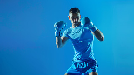 Sticker - A focused boxer in a blue outfit, posing in a fighting stance against a monochromatic blue background.