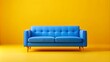 © Yauhen - Bright blue sofa isolated on yellow