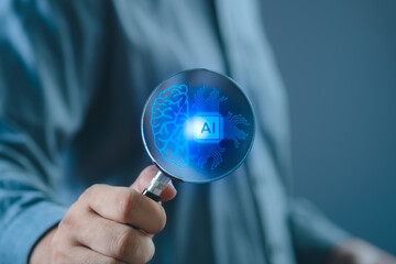 Wall Mural - searching for information in technology with ai systems concept, businessman hand holding magnifying