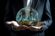 © Assyifa - Businessperson holding media image of city in palm. New technologies