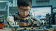 © Yuly - Asian Student Assembling Robotic Arm with Screwdriver During the Lesson. Robot is Moving. Computer Motherboard Components at Digital Interactive Whiteboard at Background. Education Concept