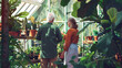 © Kyuubisa - Elderly couple gardeners working in the garden greenhouse with their family