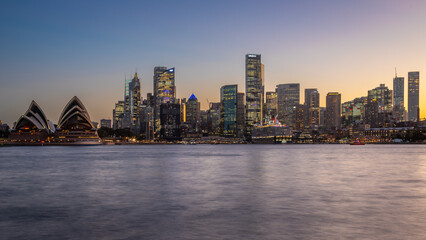 long exposure of the amazing sydney harbour bridge and sydney's downtown from the north bank namely 