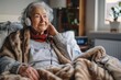© Lens Legacy - A serene elderly woman listens to music with headphones, wrapped in a warm blanket, looking pensive and content
