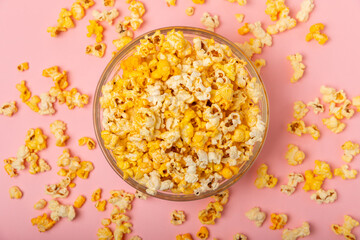 Wall Mural - Tasty popcorn in color background. Cinema and entertainment concept. Movie night with popcorn.Cheese and caramel popcorn. Delicious appetizer, snack. Place for text. Copy space.Banner