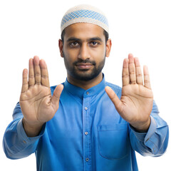 Wall Mural - young muslim man wearing blue shirt and white cap gesturing stop with both hands