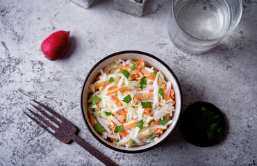 Wall Mural - Radish cabbage coleslaw in a bowl