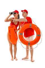 Canvas Print - Lifeguards with ring buoy, rescue tube and binoculars spotted something on white background