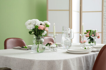 Wall Mural - Festive table setting for wedding near green wall in dining room