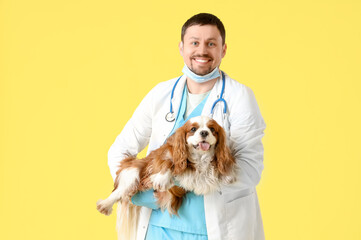 Sticker - Male veterinarian with cute dog on yellow background