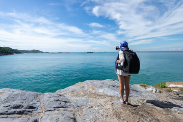 Happy traveler and tourism young women travel summer on the beach. relax outdoor destination leisure trip travel