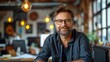 © Neural Pixels - A man wearing glasses sits in a modern office, smiling confidently at the camera