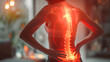 © Dina Photo Stories - woman touching her lower back, back pain illuminated with red zone. Close Up of a female Experiencing Discomfort as a Result of Spine Trauma or Arthritis. Inflammation, skeleton hernia