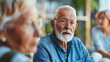 © Kateryna - a close-up image of an older veteran engaging in a group therapy session, sharing experiences with peers and receiving emotional support, Older Veterans, Special services, provide