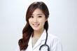 © My Beautiful Picture - Smiling asian woman doctor on white background. Woman doctor. World of Medicine. Personal care profession. Medical studies. European doctor. Asia. Asian doctor. China. Japan. AI.