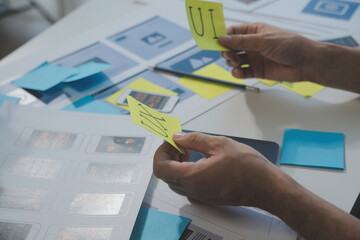 ux Graphic designer creative sketch planning application process development prototype wireframe for web mobile phone . User experience concept.