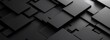 © Suphot - A modern abstract image featuring an arrangement of black geometric blocks of varying sizes, creating a sleek, minimalist design with depth and texture