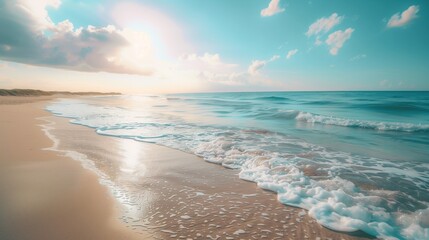 A peaceful beach with smooth, white sand and gentle waves.