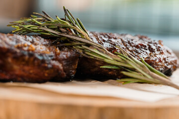 Wall Mural - Pork steak with sauce on a wooden board