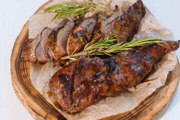 Wall Mural - Pork steak with sauce on a wooden board