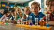 © Boontharika - Group of engaged children conducting science experiments with colorful liquids in a classroom setting, learning and discovery.