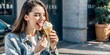 © Anelya - Woman in the city eating ice cream, daytime city street. summer happy day, joy, photo of a girl in a denim shirt generated by AI