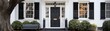 © MediaStockAI - Black front door of white house, tree and bench