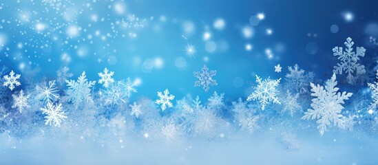 Aufkleber - A festive Christmas decor featuring silvery snowflakes on a blue shiny background providing a perfect copy space image