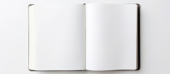 Leinwandbilder - Notebook open page on white table background School study and education concept image blank new notebook close up opened notepad low angle view. copy space available