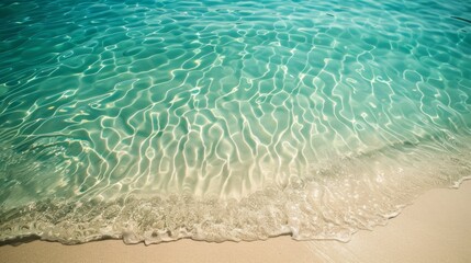 Wall Mural - Closeup photo of crystalclear turquoise waters gently lapping against a powdery white sand beach capturing the intricate patterns
