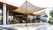 © nitiroj - Elegant cantilever pole supporting a large shade sail in a contemporary outdoor cafe setting