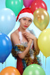 © zhagunov_a - Beautiful young woman in Santa Claus clothes