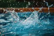 © kramynina - Splash of water on the surface of a pool
