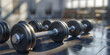 © Hammad - Closeup of many black dumbbells on rack in gym body shaping through regular sports training Dumbbells on the floor in concept fitness room with blurred gym interior jum background.