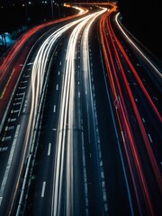 Wall Mural - A photograph of a highway at night, taken with a long exposure to emphasize the motion of traffic.