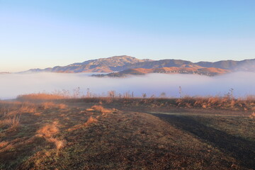 Wall Mural - Hilltops rise above the undercast in San Ramon, California