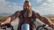 © Bijac - rugged bearded man in leather vest on motorcycle desert road trip adventure