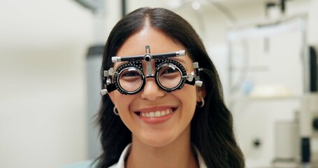 Canvas Print - Portrait, happy woman and test frame for eye care, vision and healthcare in clinic. Face, smile and patient with trail lens tool for wellness, ophthalmology and optometry for eyesight correction exam