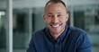 © peopleimages.com - Man, portrait and office with smile for career, casual for website development or design. Male person, creative business and happiness in workplace for job, consultant or employee at company